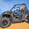 Kory on the sanddunes in a Quad